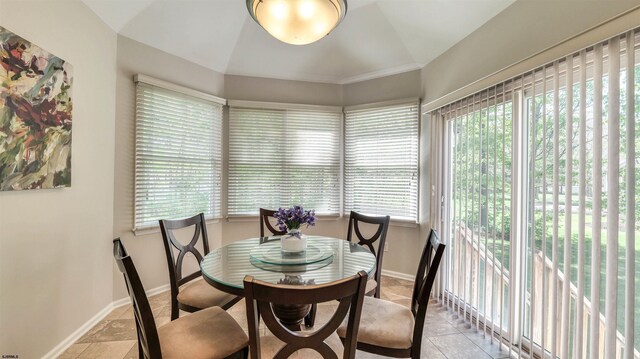 54 Hartford Dr, Egg Harbor Township, NJ 08234 - dining room featuring baseboards, light tile patterned flooring, and vaulted ceiling