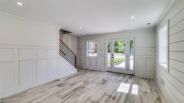 42 E New York Ave, Somers Point, NJ 08244 - entrance foyer featuring a decorative wall, stairs, ornamental molding, recessed lighting, and light wood-type flooring
