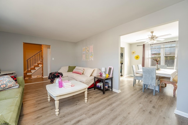 464 S Ash Ave, Galloway Township, NJ 08205 - living room featuring light wood-type flooring, baseboards, stairs, and ceiling fan