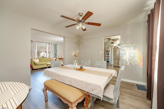 464 S Ash Ave, Galloway Township, NJ 08205 - dining area with a ceiling fan, wood finished floors, and baseboards