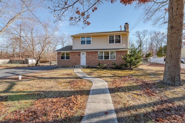 464 S Ash Ave, Galloway Township, NJ 08205 - traditional home featuring a chimney and brick siding