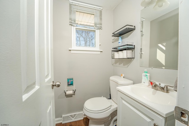 464 S Ash Ave, Galloway Township, NJ 08205 - bathroom featuring toilet, baseboards, vanity, and wood finished floors