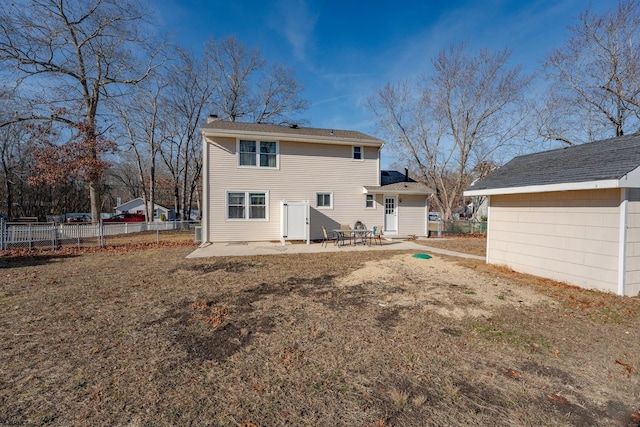 464 S Ash Ave, Galloway Township, NJ 08205 - rear view of house featuring a patio, fence, and a chimney