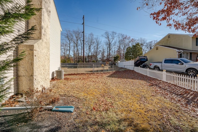 464 S Ash Ave, Galloway Township, NJ 08205 - view of yard featuring central air condition unit and fence