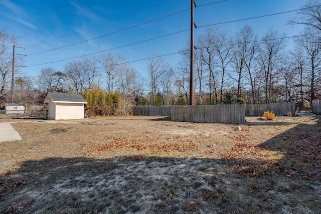 464 S Ash Ave, Galloway Township, NJ 08205 - view of yard featuring fence, an outdoor structure, and a storage unit