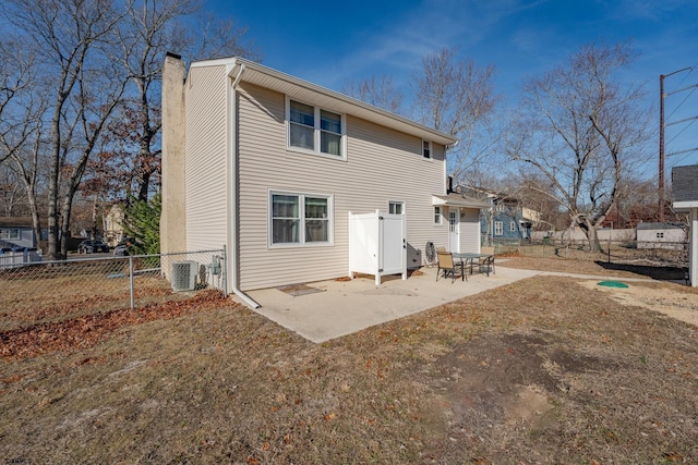 464 S Ash Ave, Galloway Township, NJ 08205 - rear view of property with a chimney, fence, a patio area, and cooling unit