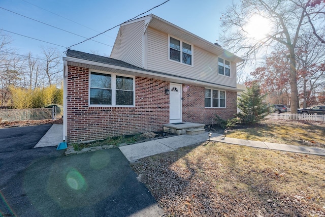 464 S Ash Ave, Galloway Township, NJ 08205 - view of front of house featuring brick siding and fence