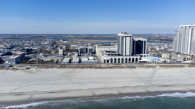 view of urban area with a nearby body of water