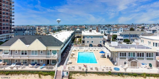 drone / aerial view of a pool