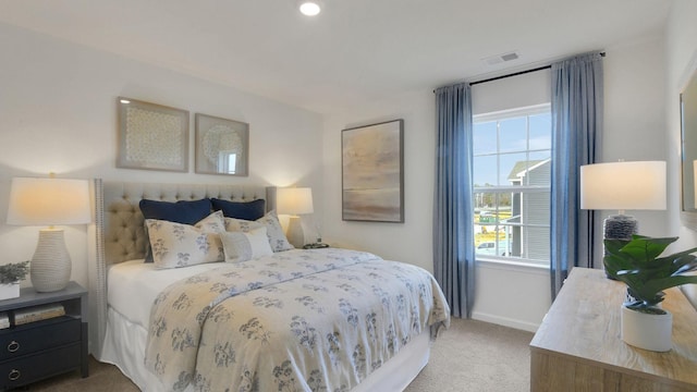 carpeted bedroom with multiple windows, baseboards, and recessed lighting
