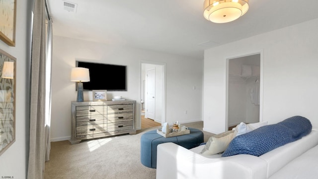 living room with light colored carpet and baseboards