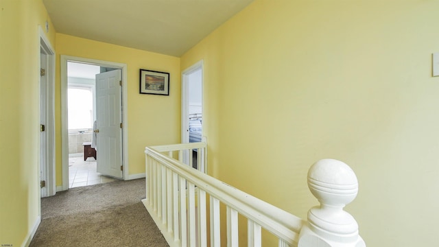 14 N Hillside Ave, Ventnor, NJ 08406 - hall with carpet flooring, an upstairs landing, and baseboards