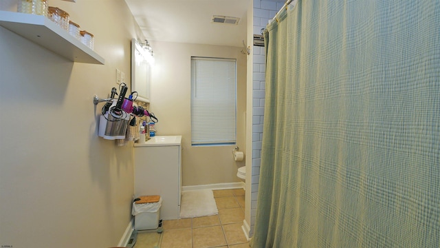 14 N Hillside Ave, Ventnor, NJ 08406 - full bath with toilet, tile patterned flooring, vanity, baseboards, and a shower with shower curtain