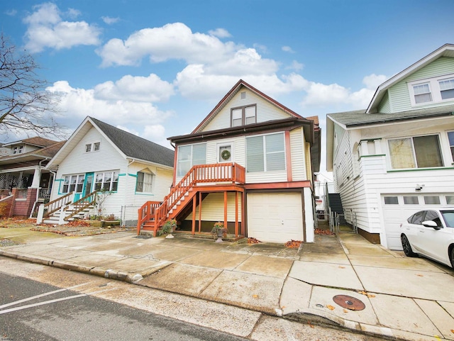 14 N Hillside Ave, Ventnor, NJ 08406 - view of front facade featuring stairs, an attached garage, and driveway