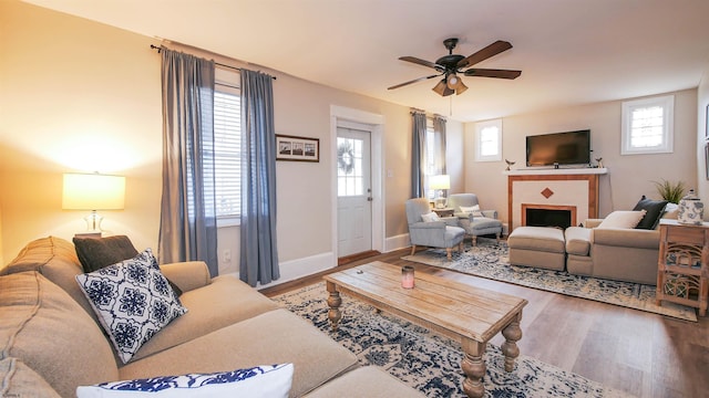 14 N Hillside Ave, Ventnor, NJ 08406 - living room with wood finished floors, a fireplace, a ceiling fan, and baseboards
