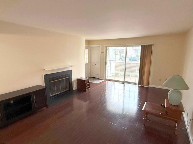 550 Central Avenue G-14Constitution Ct, Linwood, NJ 08221 - living area with a fireplace with flush hearth, dark wood-style floors, and baseboards