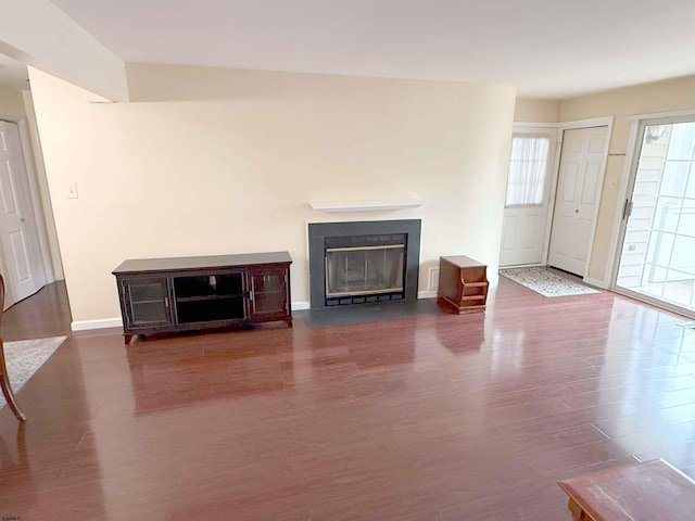 550 Central Avenue G-14Constitution Ct, Linwood, NJ 08221 - unfurnished living room with wood finished floors, a fireplace with flush hearth, and baseboards