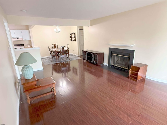 550 Central Avenue G-14Constitution Ct, Linwood, NJ 08221 - living area with wood finished floors, a glass covered fireplace, and baseboards