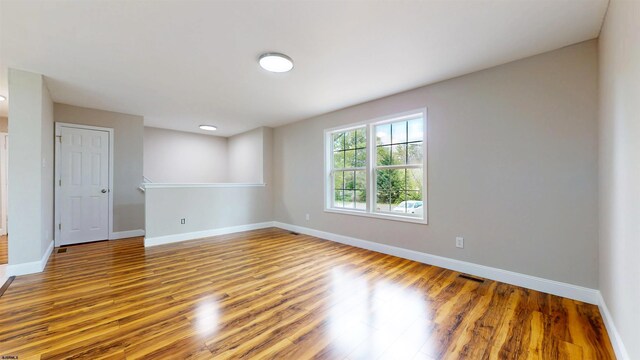 928 S Mill, Vineland, NJ 08360 - unfurnished room featuring wood finished floors and baseboards