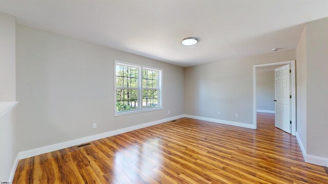 928 S Mill, Vineland, NJ 08360 - unfurnished room featuring wood finished floors and baseboards