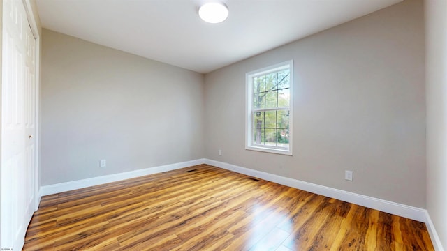 928 S Mill, Vineland, NJ 08360 - spare room featuring wood finished floors and baseboards