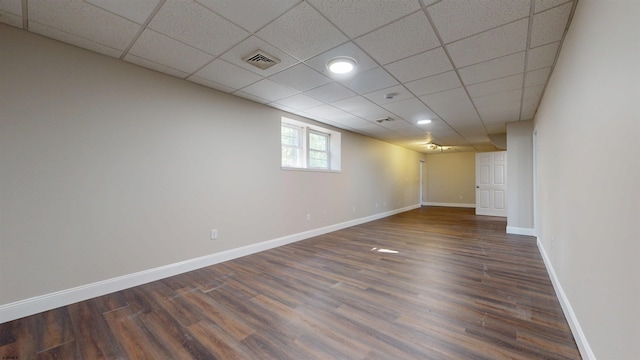 928 S Mill, Vineland, NJ 08360 - below grade area with dark wood-style flooring, baseboards, and a drop ceiling