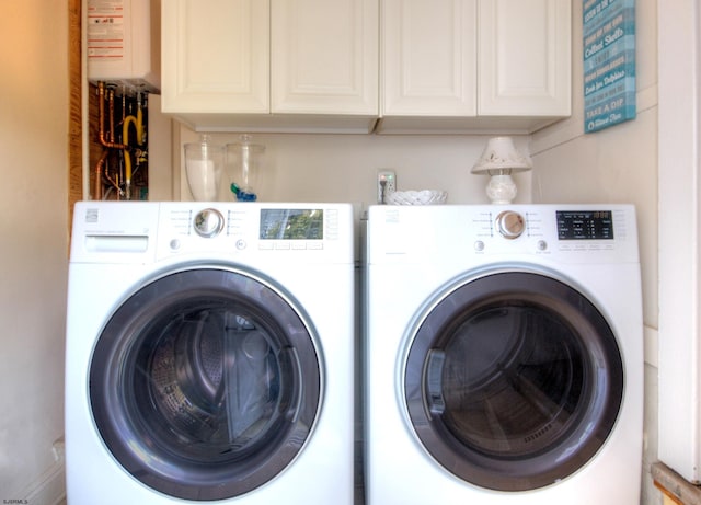 15 N Douglas Ave, Margate, NJ 08402 - laundry area featuring washer and dryer and cabinet space
