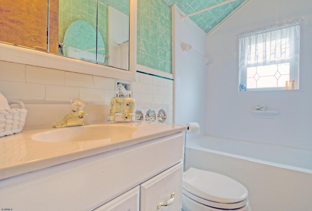 15 N Douglas Ave, Margate, NJ 08402 - bathroom with vanity, backsplash, toilet, and vaulted ceiling