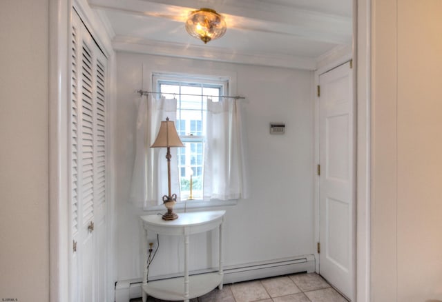15 N Douglas Ave, Margate, NJ 08402 - foyer entrance with a baseboard radiator, ornamental molding, and light tile patterned flooring