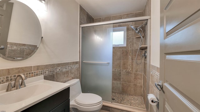 31 English Ln, Egg Harbor Township, NJ 08234 - full bathroom featuring tile walls, a shower stall, toilet, vanity, and wainscoting