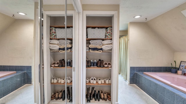 31 English Ln, Egg Harbor Township, NJ 08234 - full bath with lofted ceiling, tile patterned flooring, a bath, a walk in closet, and recessed lighting