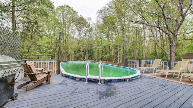 31 English Ln, Egg Harbor Township, NJ 08234 - wooden terrace featuring an outdoor pool