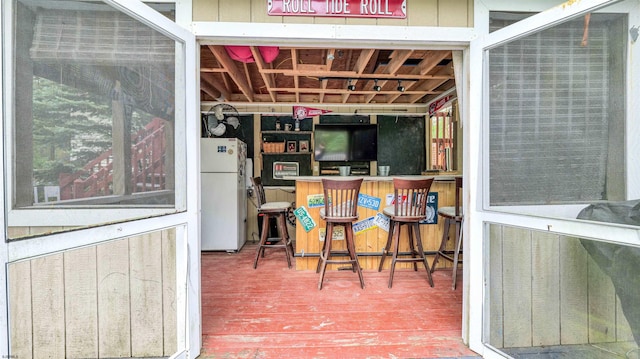 31 English Ln, Egg Harbor Township, NJ 08234 - indoor dry bar with freestanding refrigerator and wood finished floors