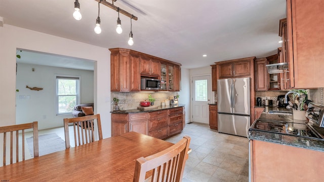 31 English Ln, Egg Harbor Township, NJ 08234 - kitchen with stainless steel appliances, decorative backsplash, a sink, brown cabinets, and recessed lighting