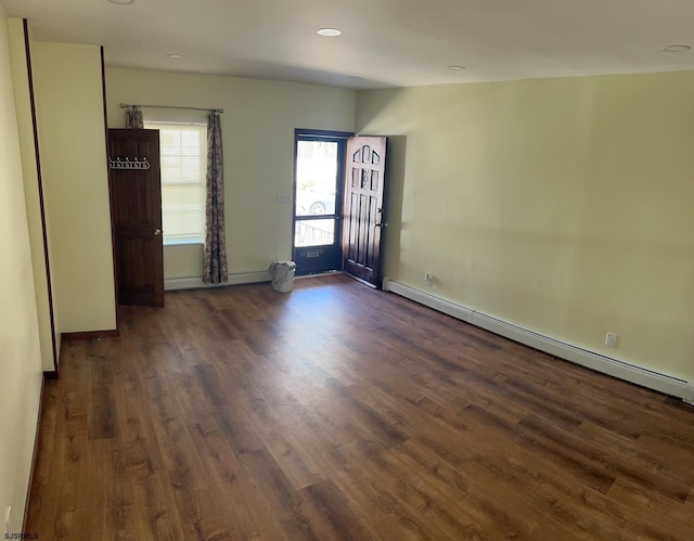 2910 Sunset Ave, Atlantic City, NJ 08401 - unfurnished room with a baseboard heating unit, dark wood-style floors, baseboards, and recessed lighting