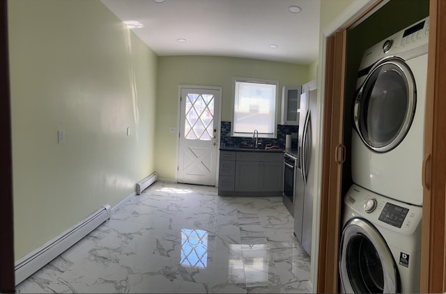2910 Sunset Ave, Atlantic City, NJ 08401 - laundry room with stacked washer / dryer, baseboard heating, light marble finish floors, and recessed lighting