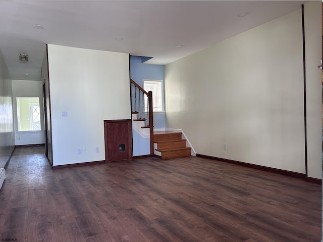 2910 Sunset Ave, Atlantic City, NJ 08401 - unfurnished living room featuring dark wood finished floors, plenty of natural light, and stairway