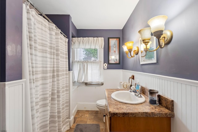 1224 Front St, Mauricetown, NJ 08329 - full bathroom featuring wainscoting, vanity, a chandelier, toilet, and curtained shower