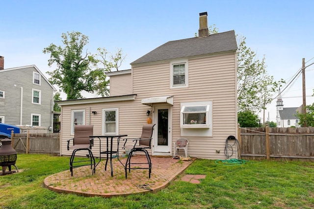 1224 Front St, Mauricetown, NJ 08329 - rear view of house with a patio and a chimney