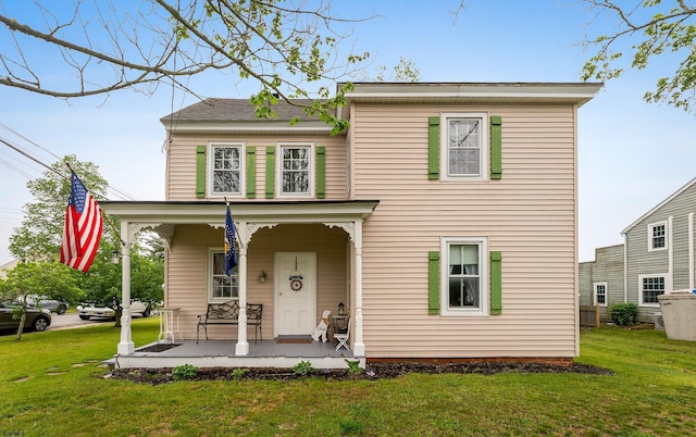 1224 Front St, Mauricetown, NJ 08329 - view of front facade featuring covered porch and a front lawn