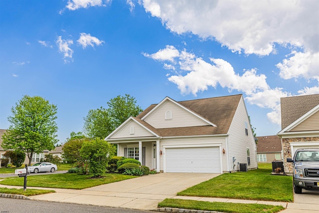 31 Leah Ct, Hammonton, NJ 08037 - traditional home with a front lawn, driveway, an attached garage, and a shingled roof