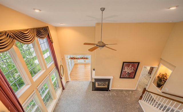 31 Leah Ct, Hammonton, NJ 08037 - hallway featuring healthy amount of natural light, a high ceiling, carpet floors, and baseboards