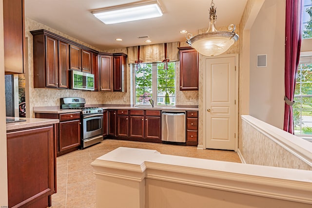 31 Leah Ct, Hammonton, NJ 08037 - kitchen with stainless steel appliances, backsplash, plenty of natural light, a sink, and recessed lighting