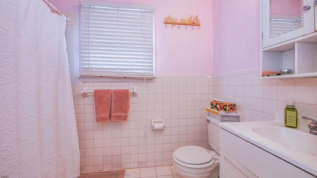 9402 Ventnor Ave, Margate, NJ 08402 - bathroom with toilet, tile walls, vanity, tile patterned flooring, and a shower with shower curtain