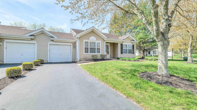 628 E Regency Dr Unit 628, Galloway Township, NJ 08205 - ranch-style house with an attached garage, asphalt driveway, and a front lawn