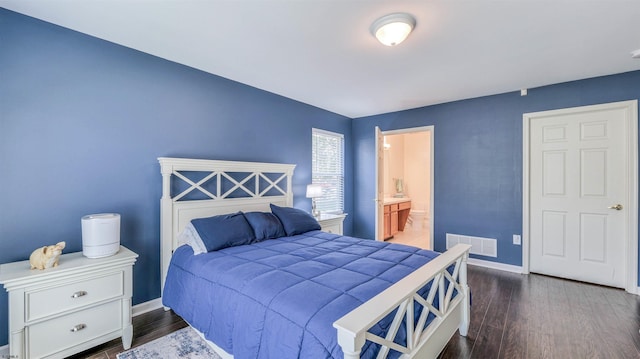 628 E Regency Dr Unit 628, Galloway Township, NJ 08205 - bedroom featuring wood finished floors, baseboards, and connected bathroom