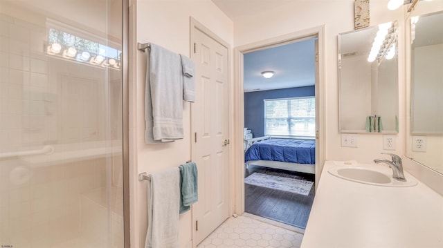 628 E Regency Dr Unit 628, Galloway Township, NJ 08205 - bathroom with ensuite bath, a stall shower, tile patterned floors, and vanity