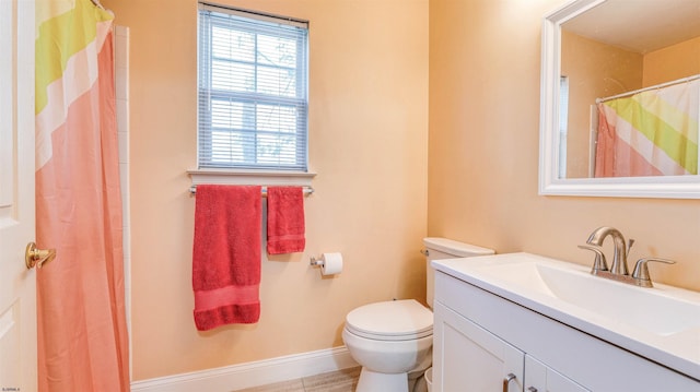 628 E Regency Dr Unit 628, Galloway Township, NJ 08205 - bathroom with baseboards, toilet, vanity, and curtained shower