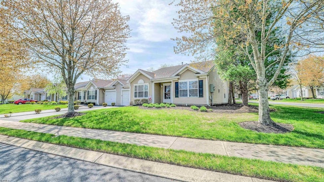 628 E Regency Dr Unit 628, Galloway Township, NJ 08205 - ranch-style home featuring a garage, driveway, and a front lawn