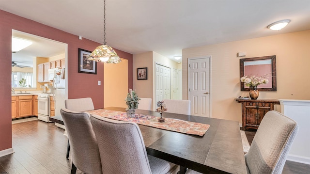 628 E Regency Dr Unit 628, Galloway Township, NJ 08205 - dining room with dark wood-style floors and baseboards